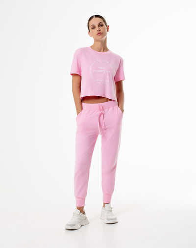 Jogger slim fit tiro medio rosado