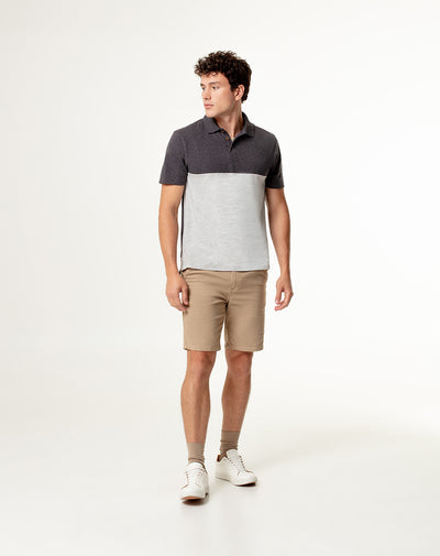 Polo slim fit gris jaspeada con bloques