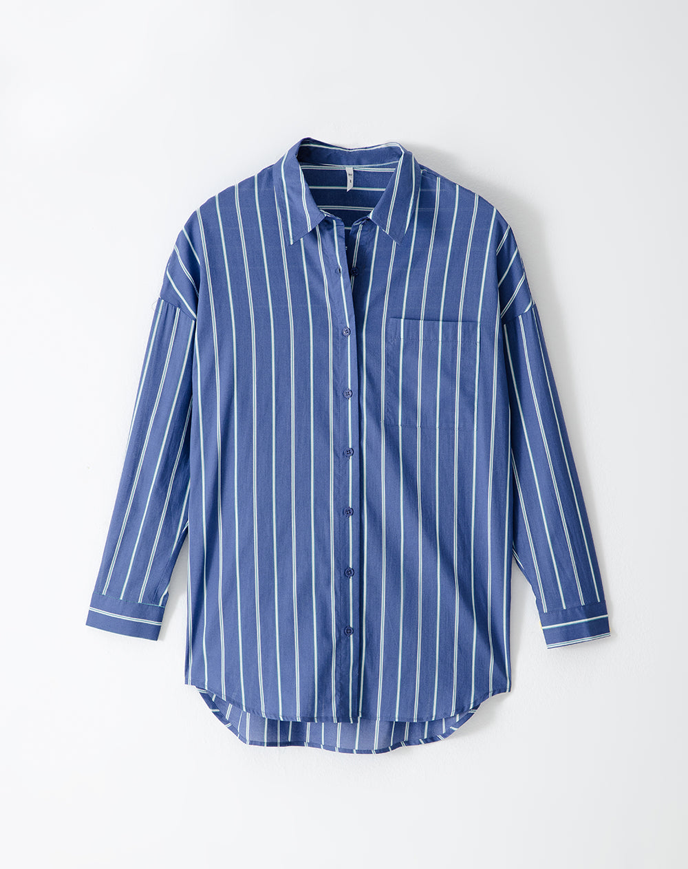 Camisa relaxed fit manga larga rayas azules