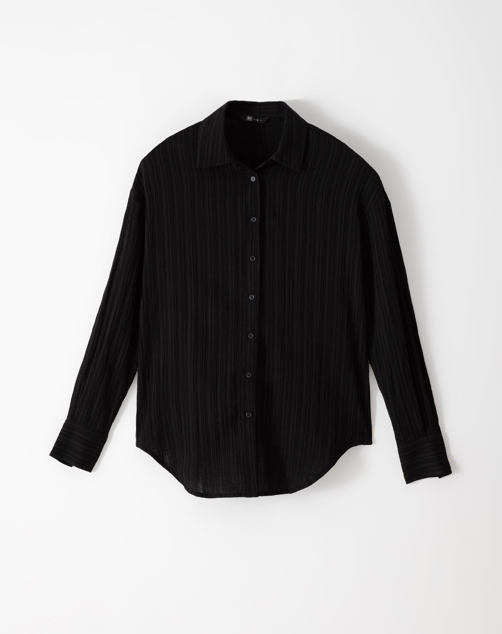 Camisa oversized fit manga larga negra